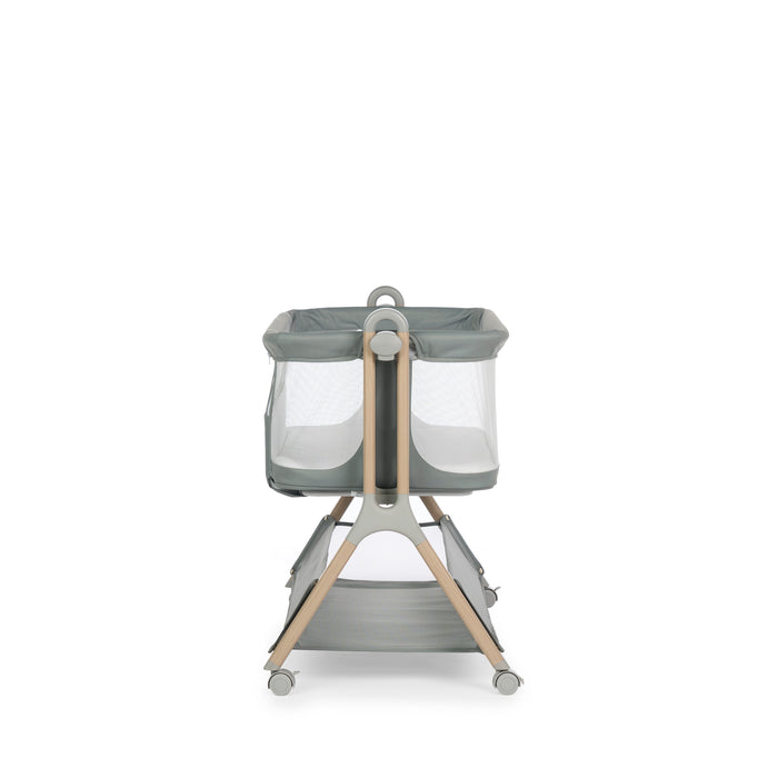 Sage crib with wood effect frame & grey plastics, crib has 4 mesh sides & storage basket underneath crib.