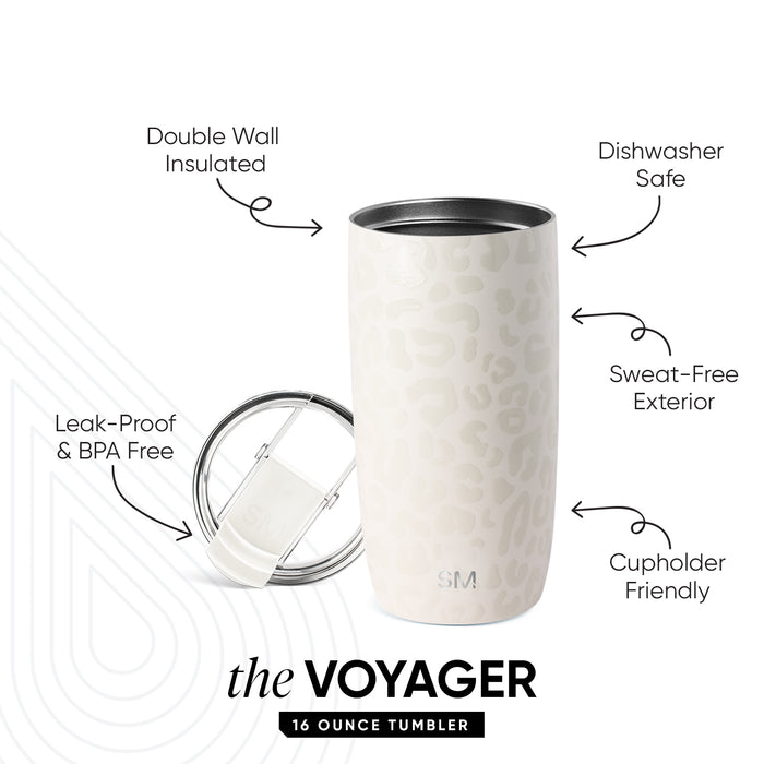 Cream-colored insulated tumbler with dark lid displayed in studio setting. Product callouts highlight double-wall insulation, dishwasher safe, sweat-free exterior, cupholder friendly, and leak-proof design. "The Voyager"